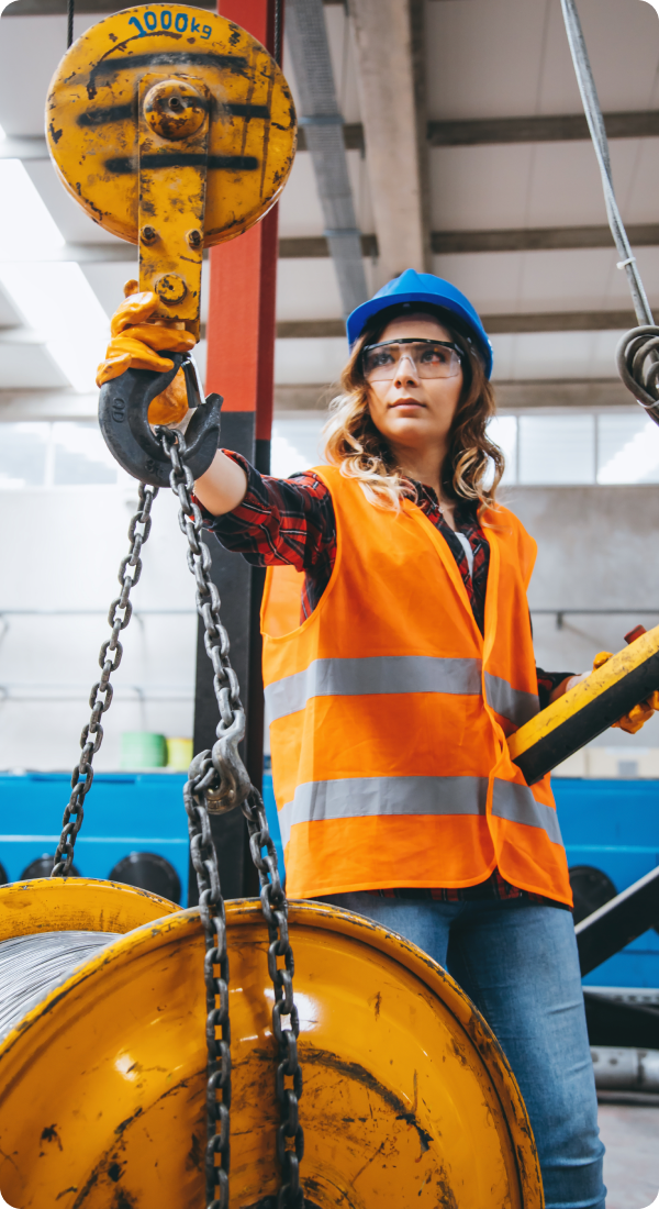 Worker operating industrial crane