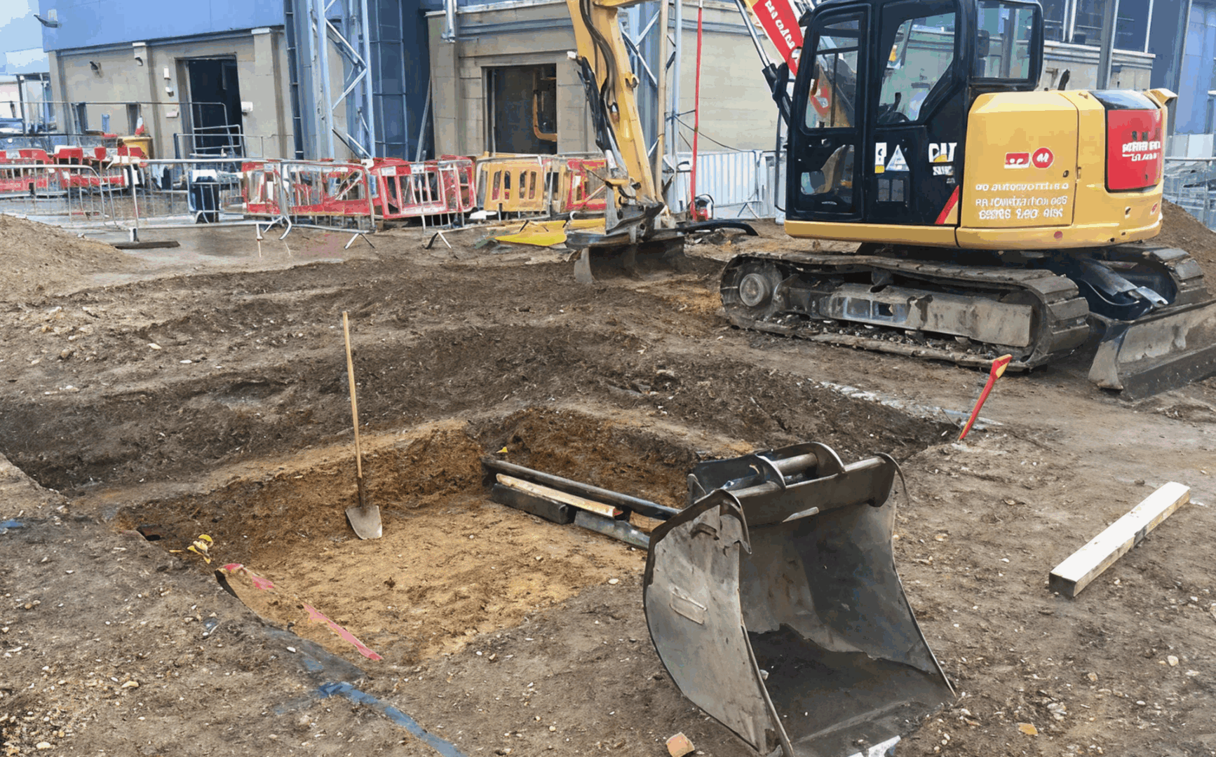 Construction equipment near deep excavation