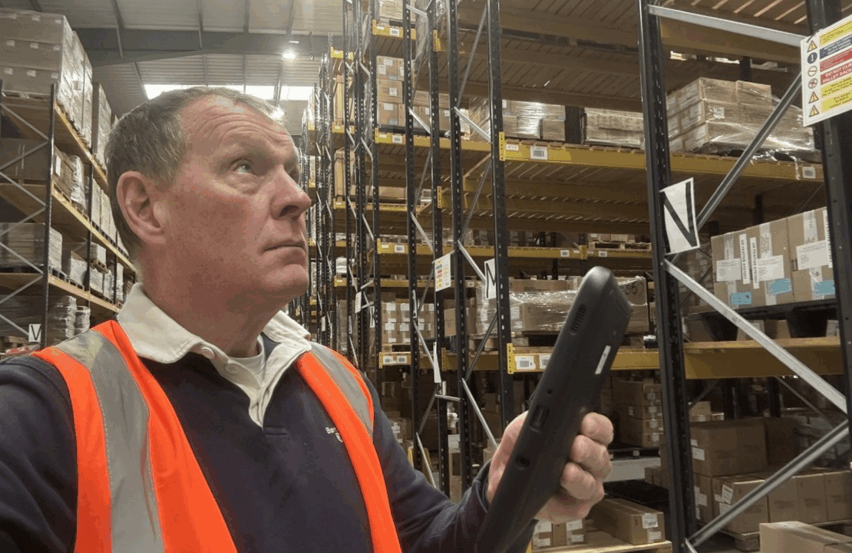 Warehouse worker scanning inventory